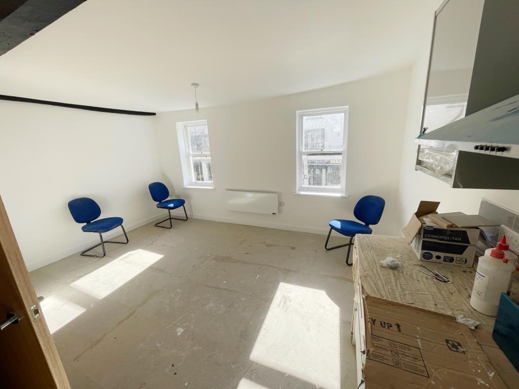 Lot: 161 - VACANT COMMERCIAL PREMISE WITH TWO FLATS ABOVE FOR COMPLETION - Alternative view Flat A first floor living room/kitchen